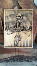 Load and play video in Gallery viewer, Skeleton Riding Bike Wood Carving – Wall Art